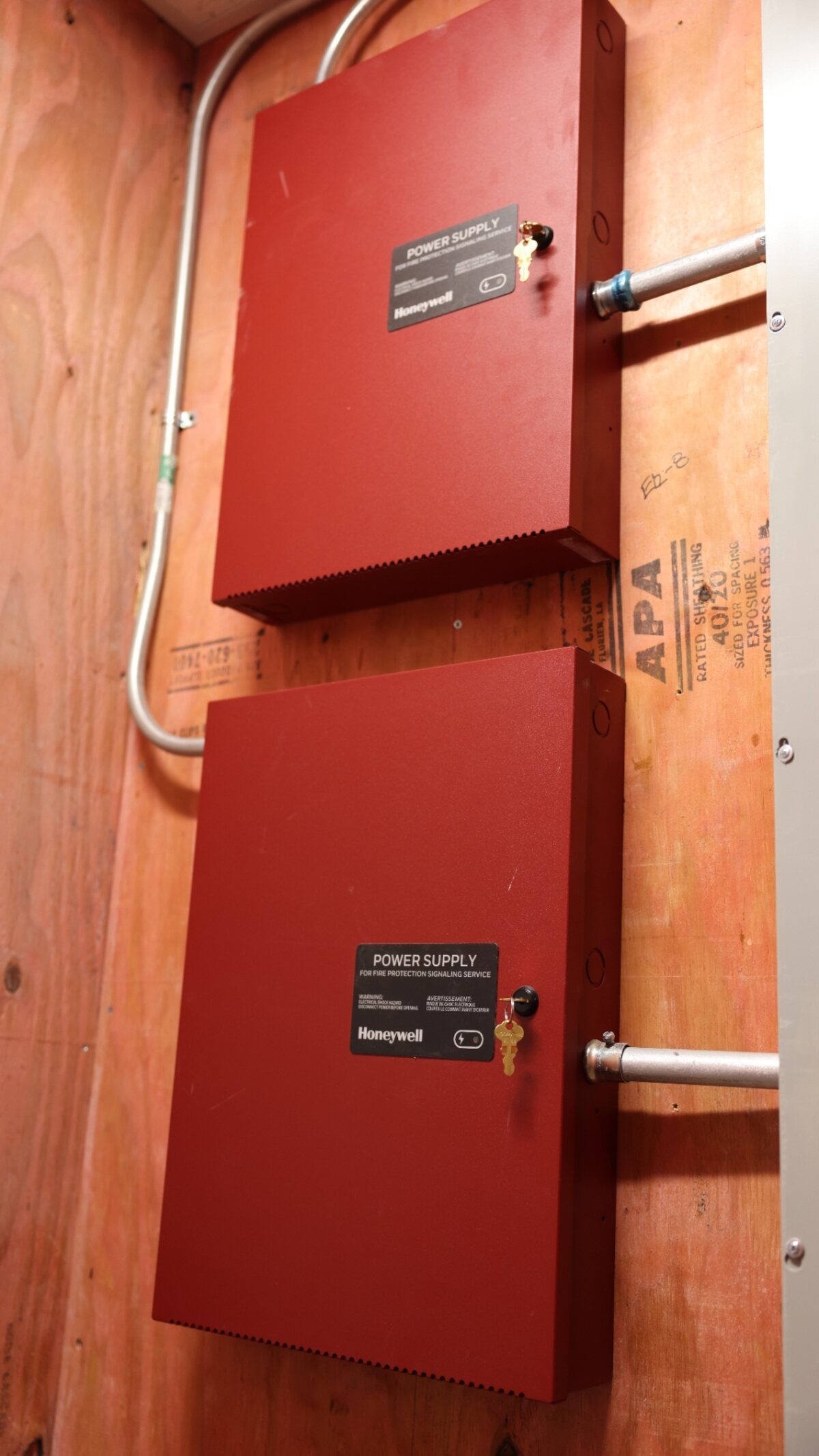 Fire alarm power supply and battery cabinet — NFPA 72 secondary power for a Texas commercial FACP