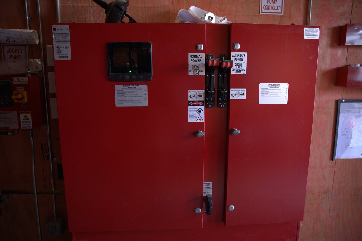 Fire pump controller with amber run light and manual test switch — Zion service call, Texas commercial facility