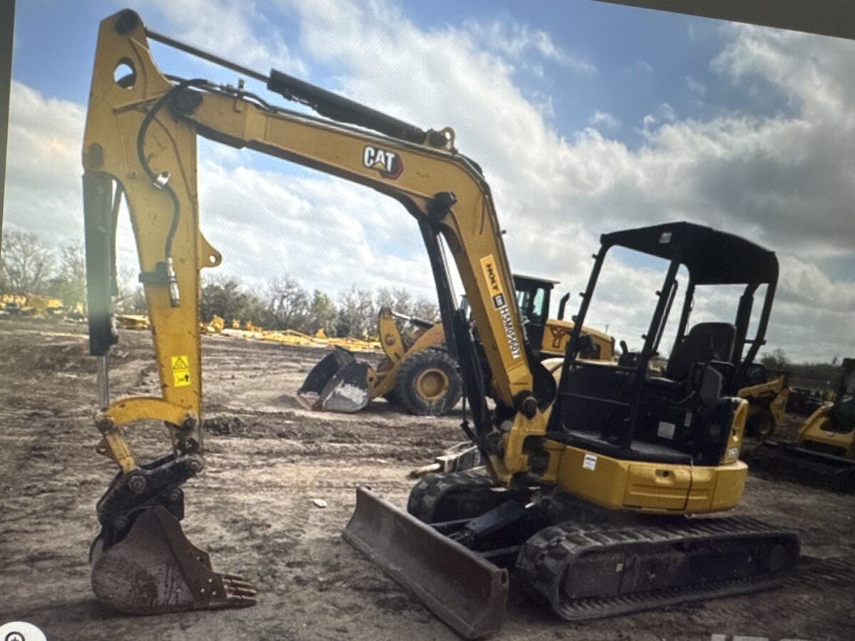 CAT mini-excavator at a Zion underground fire line job